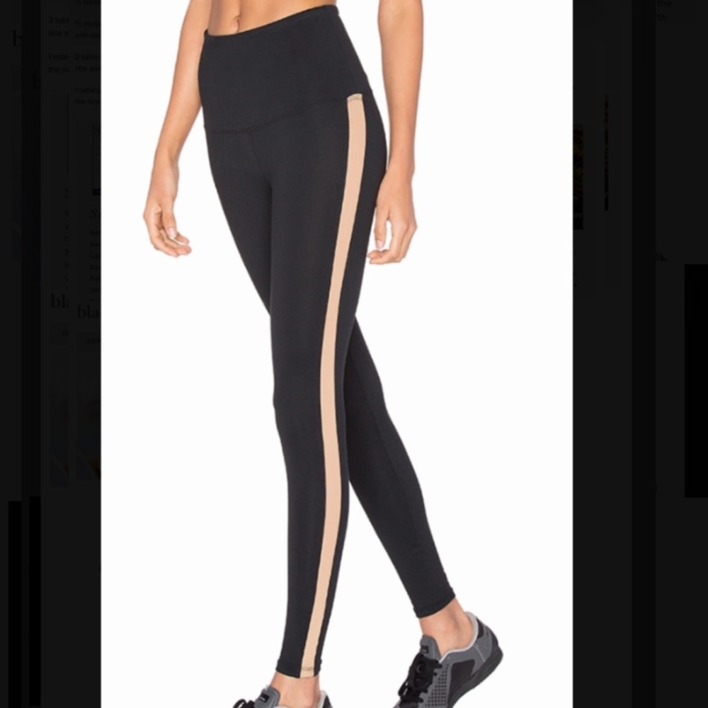 Strut This black leggings with tan mesh stripe